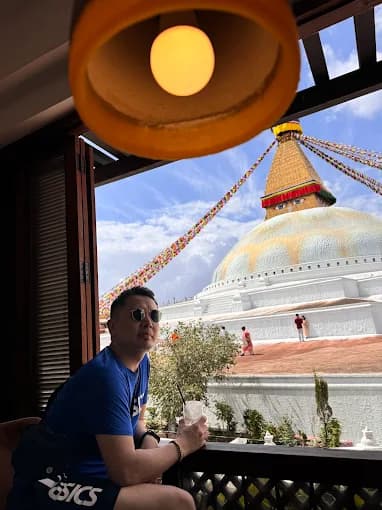 Cafe view of the Boudhanath stupa, Kathmandu, during a sourcing trip